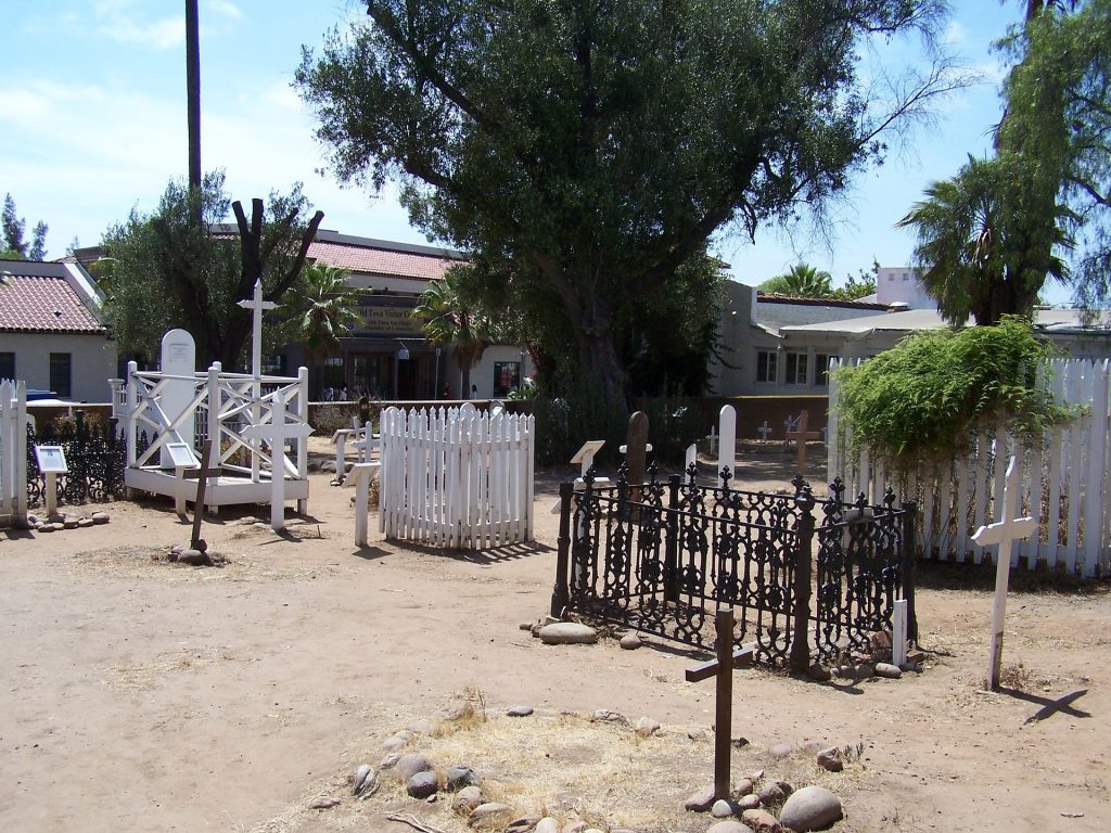 Empty old graveyard in the burning daylight with trees in Old Town San Diego