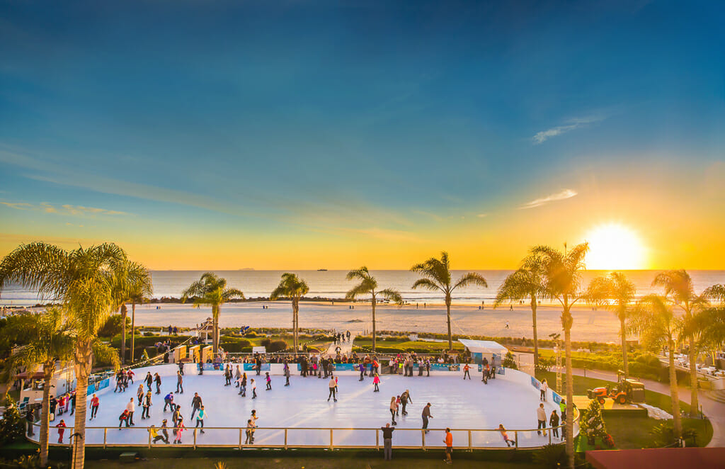 ice rink on the beach in Coronado with palm trees at sunset