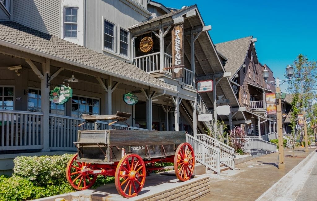 Historic Old Town Temecula with "Wild West" style wood buildings and a wood wagon parked in front of buildings