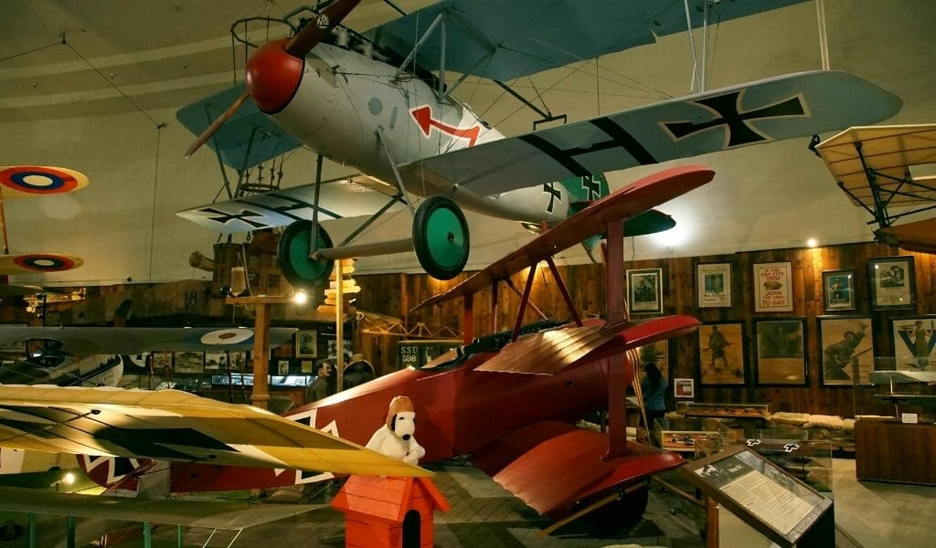 Inside of San Diego Air and Space Museum: Collection of various antique airplanes - Best Museums in San Diego