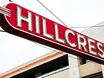 Red, retro sign reading Hillcrest. Hillcrest neighborhood San Diego