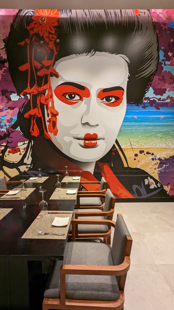 hotel restaurant at Hard rock Hotel Los Cabos with Japanese themed mural