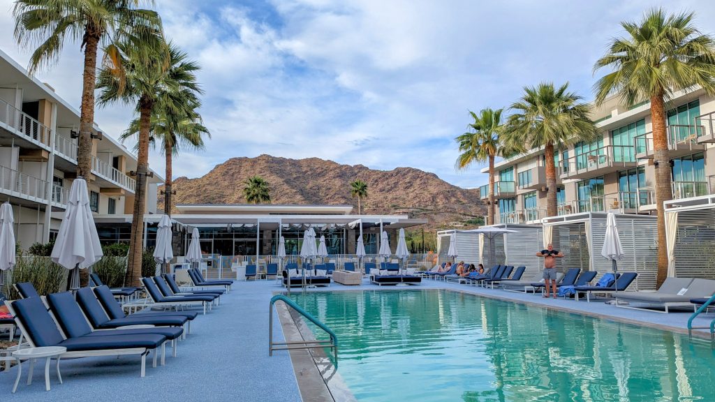 Mountain shadows Resort Pool with Palm trees and Camelback mountain in the background