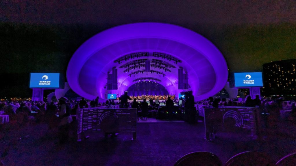 San Diego Rady Shell Concert Hall during concert at night, lid up in purple - Things to so in San Diego at night