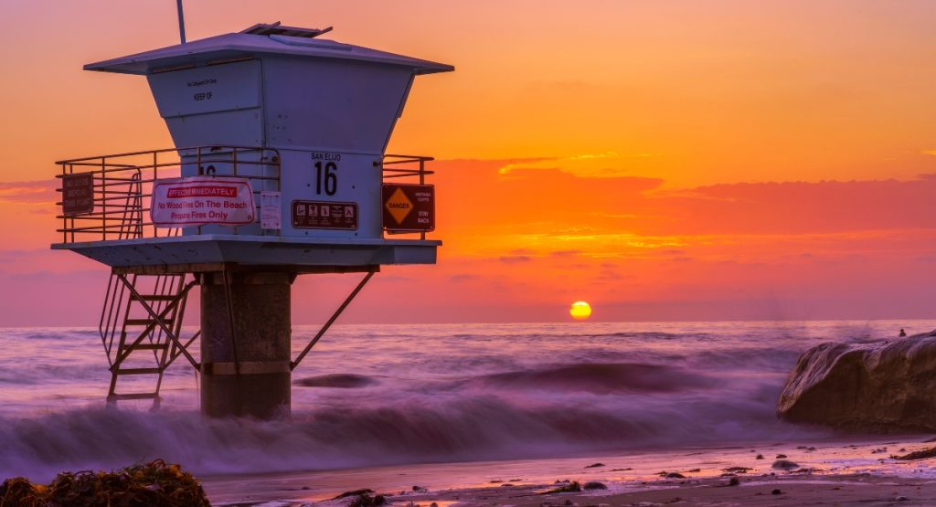Lifeguard tower on a beach in Encinitas during sunset