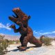 huge rusty metal dinosaur sculpture at Galleta Meadows Estate Borrego Springs - San Diego Day Trips